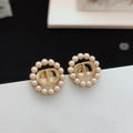 Dior Rose-Gold-Tone Pearl-Look Halo Stud Earrings - product image 1