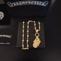 Chrome Hearts Gold-Tone Shield Pendant Necklace - album image 1