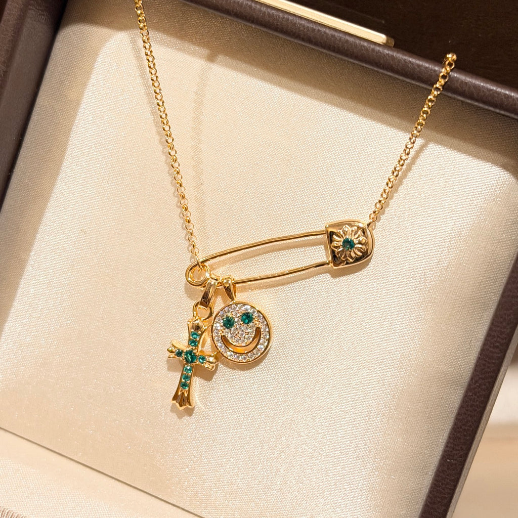 Chrome Hearts Gold-Tone Pin and Smiley Charm Necklace - album image 9