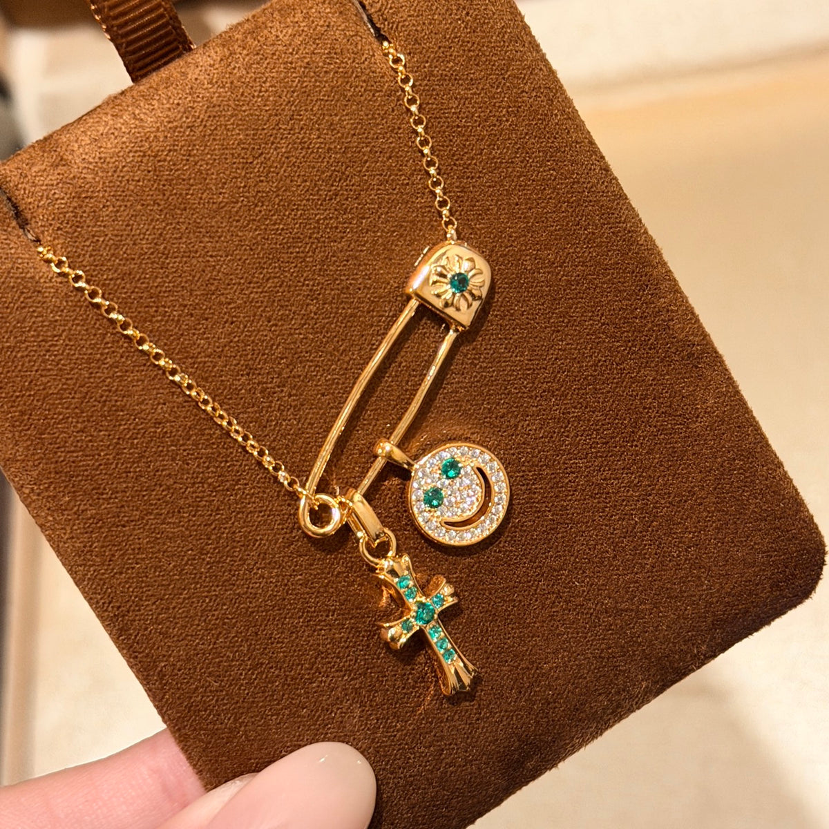 Chrome Hearts Gold-Tone Pin and Smiley Charm Necklace - album image 1