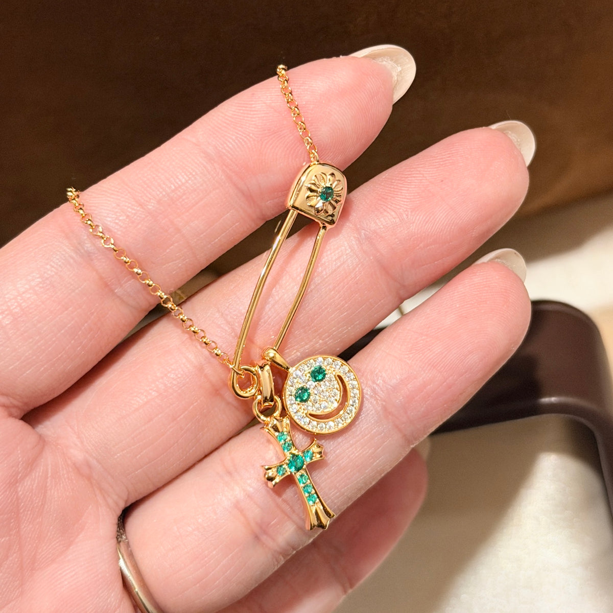 Chrome Hearts Gold-Tone Pin and Smiley Charm Necklace - album image 6
