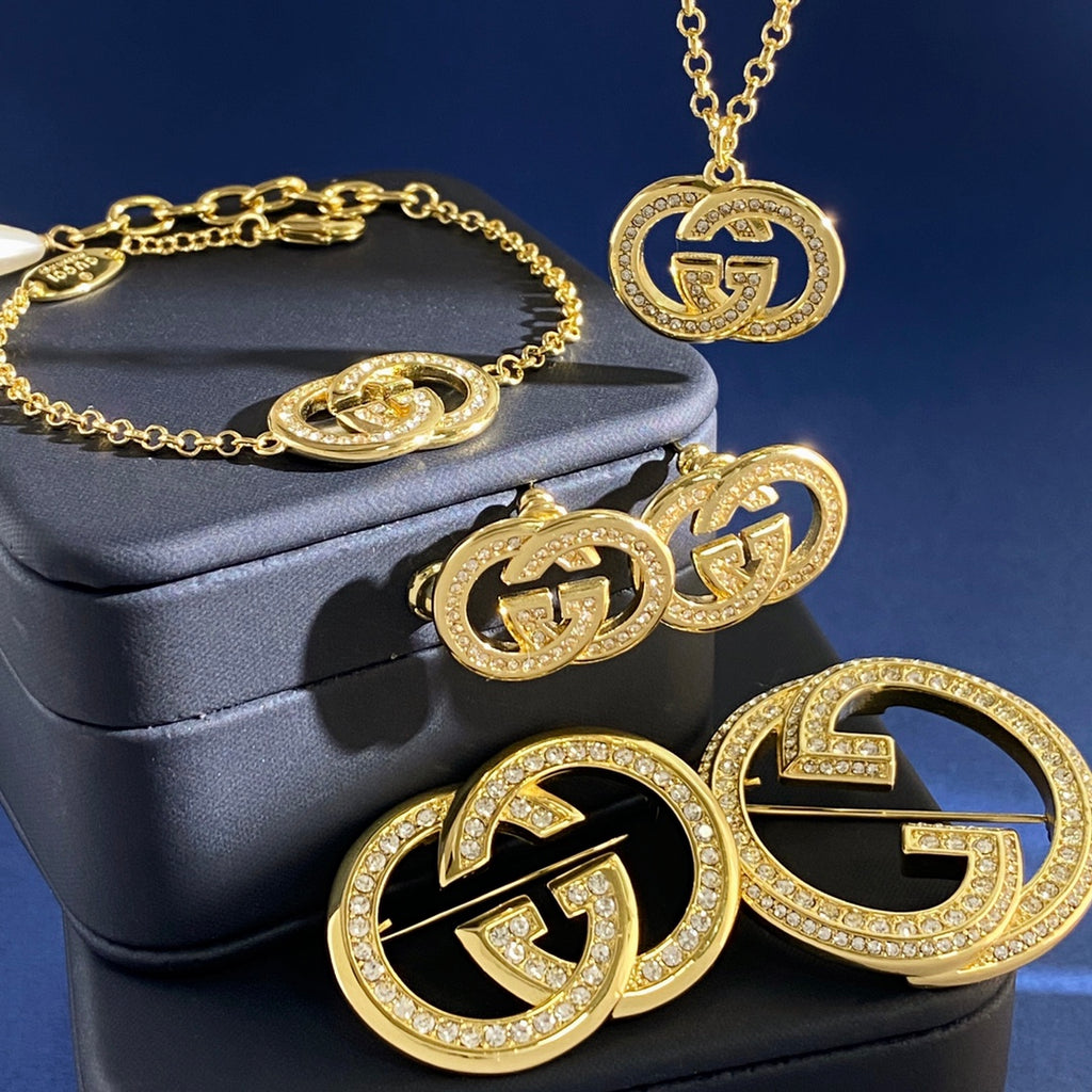 Gucci Gold-Tone Interlocking G Brooch - album image 9