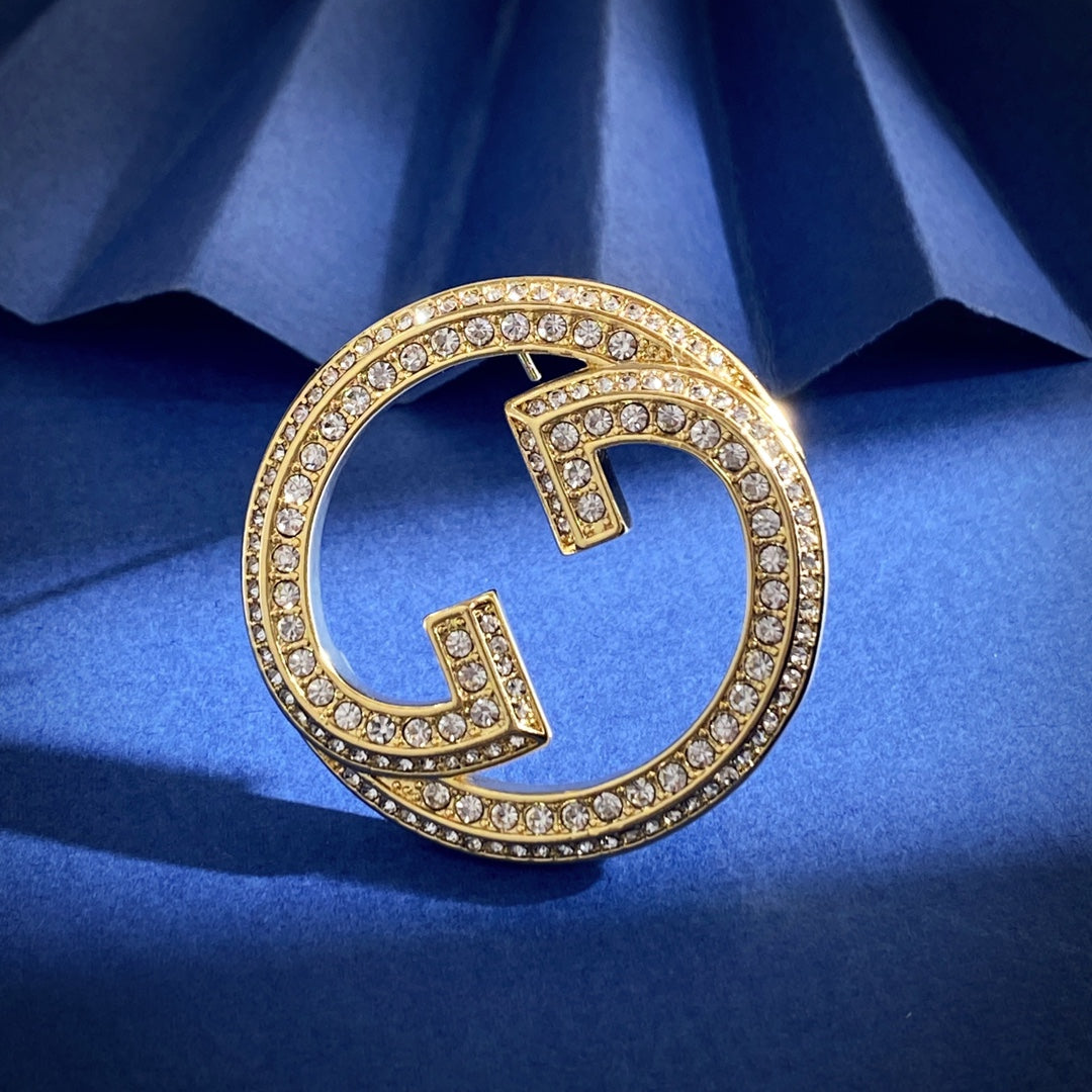Gucci Gold-Tone Crystal Circular G Brooch - album image 1