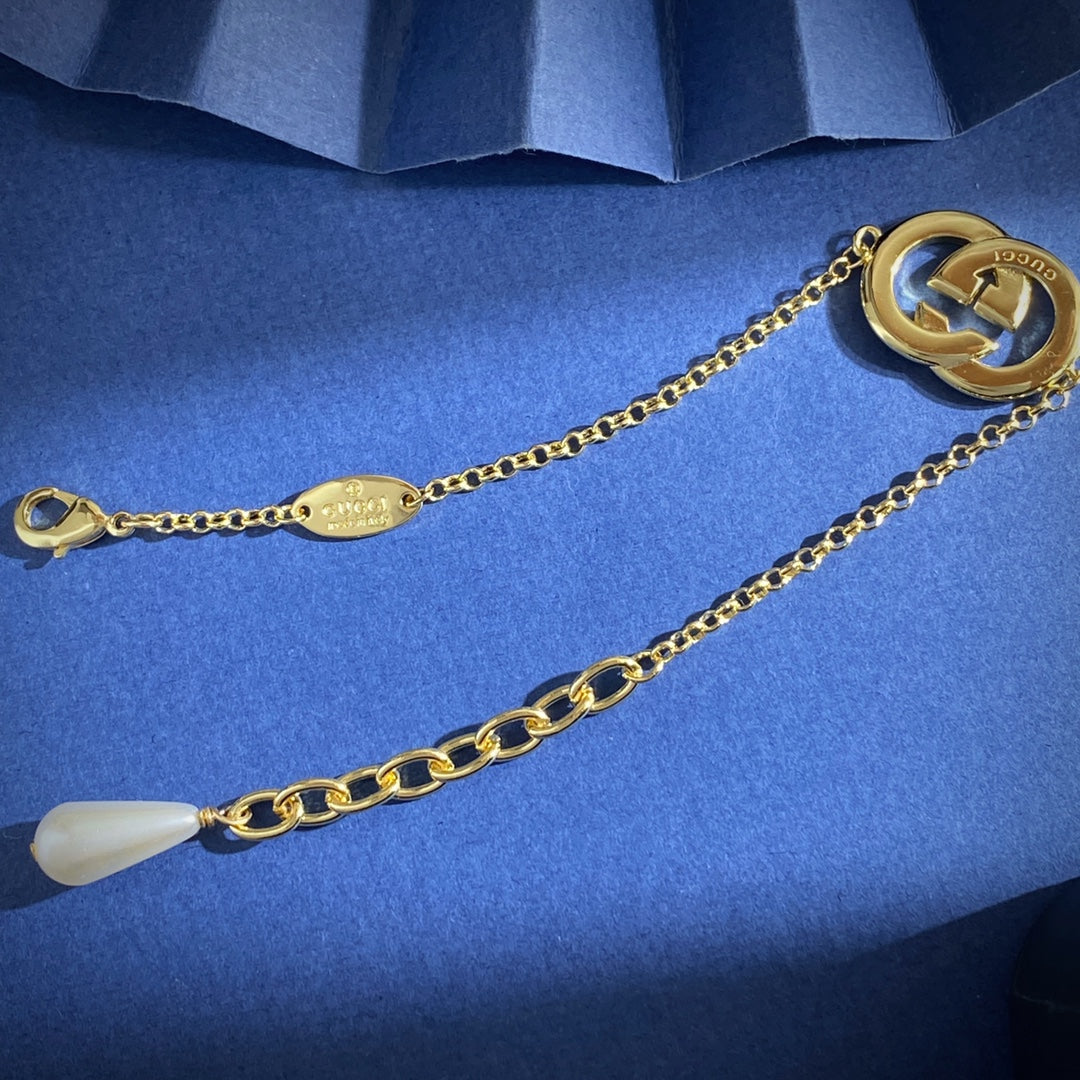Gucci Gold-Tone Double G Charm Bracelet - album image 3