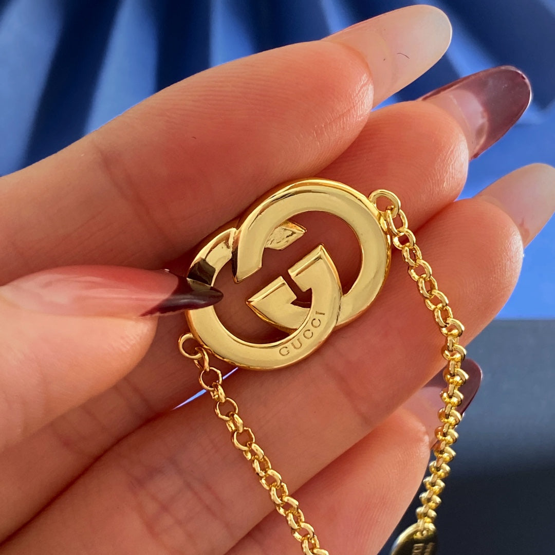 Gucci Gold-Tone Double G Charm Bracelet - album image 4