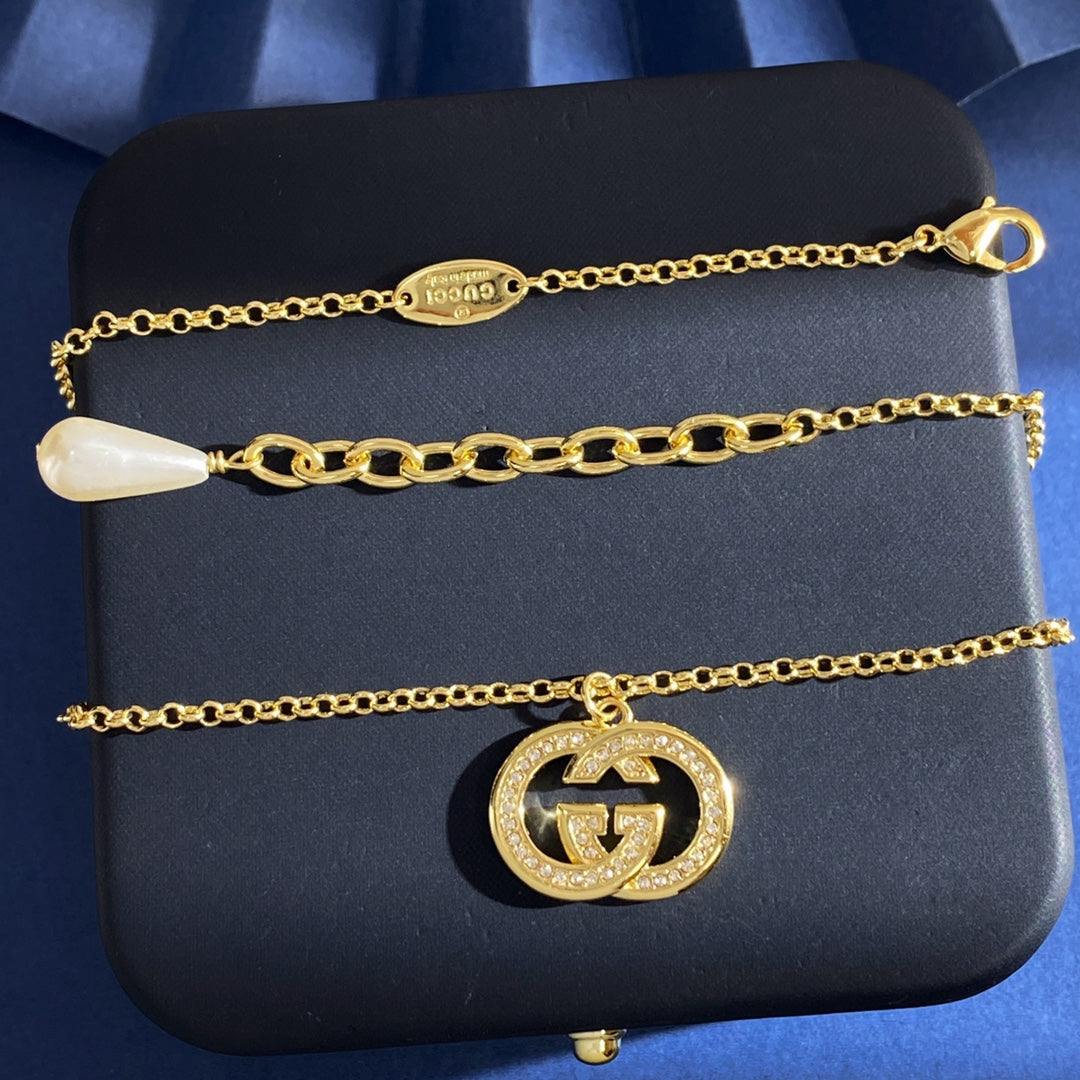 Gucci Gold-Tone Double G Drop Pendant Necklace - album image 7