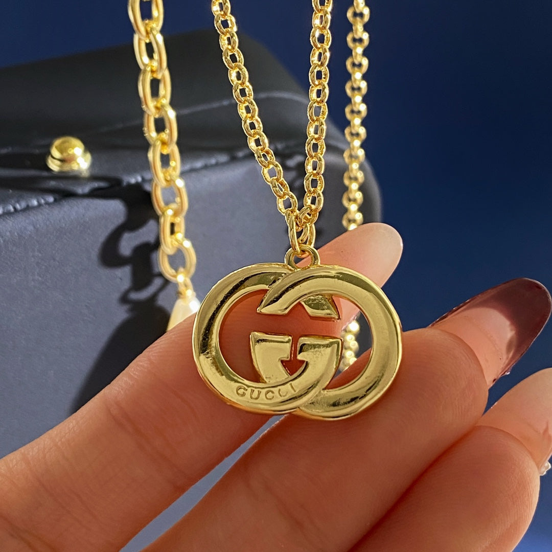 Gucci Gold-Tone Double G Drop Pendant Necklace - album image 4