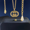 Gucci Gold-Tone Double G Drop Pendant Necklace - album image 1