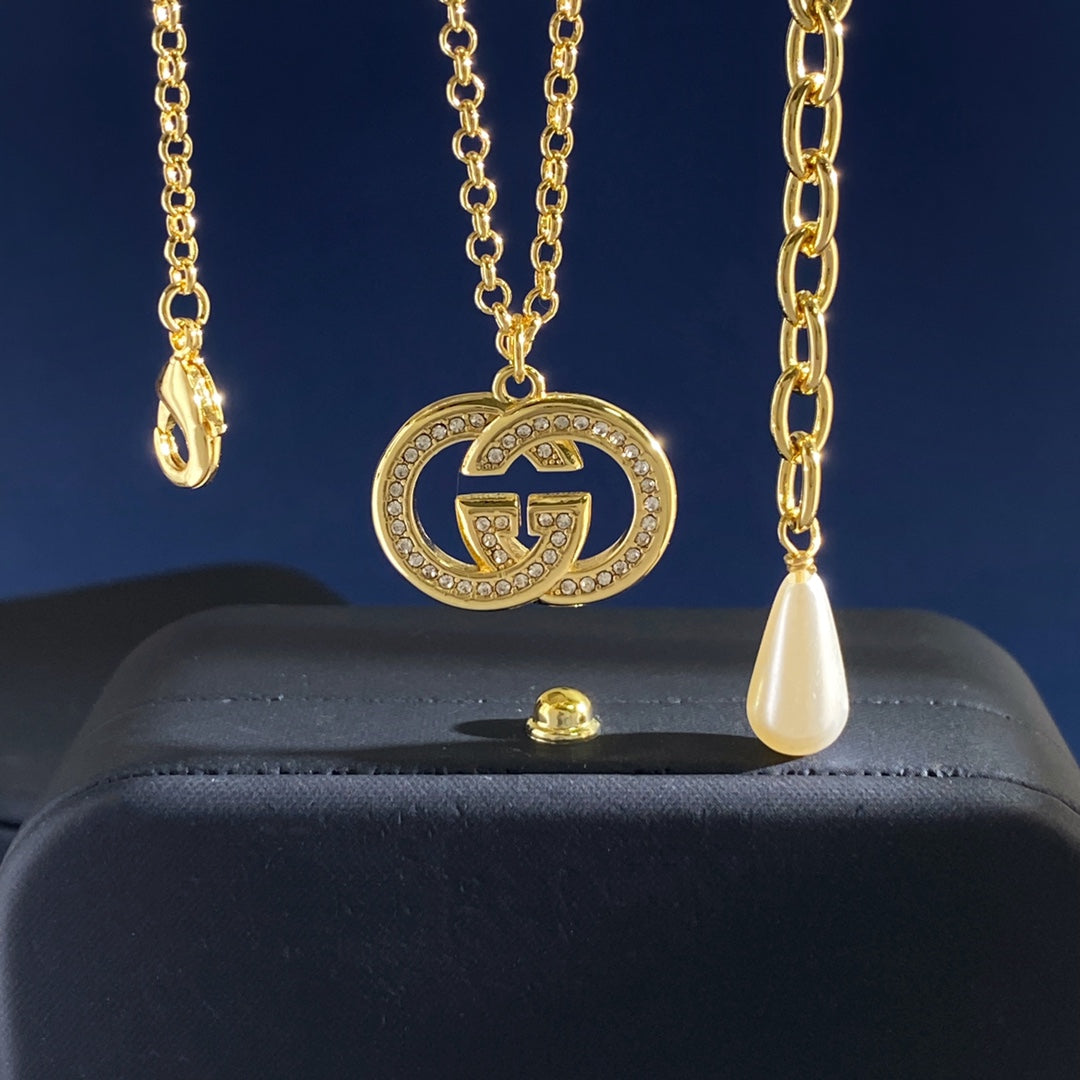 Gucci Gold-Tone Double G Drop Pendant Necklace - album image 1