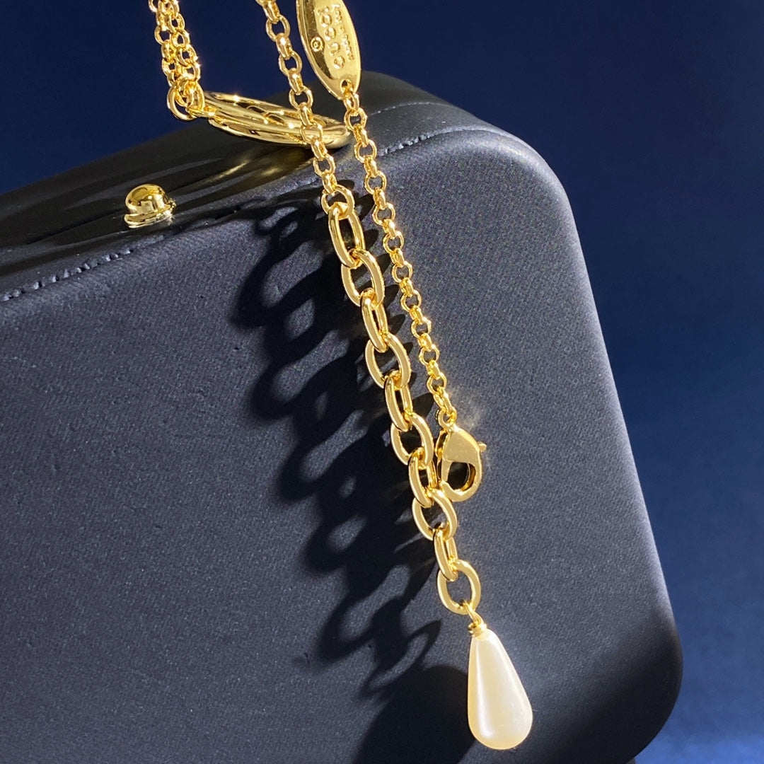 Gucci Gold-Tone Double G Drop Pendant Necklace - album image 3