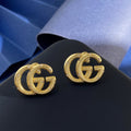 Gucci Interlocking G Gold-Tone GG Letter Stud Earrings - album image 1