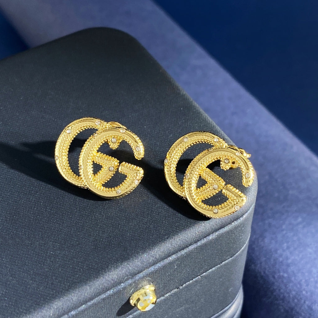 Gucci Interlocking G Gold-Tone GG Letter Stud Earrings - album image 8