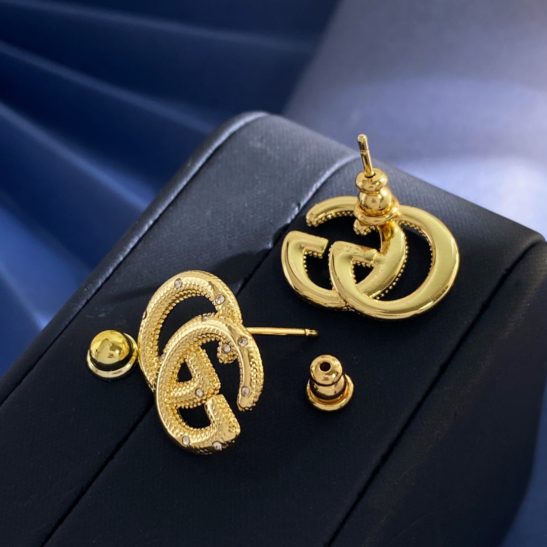Gucci Interlocking G Gold-Tone GG Letter Stud Earrings - album image 7