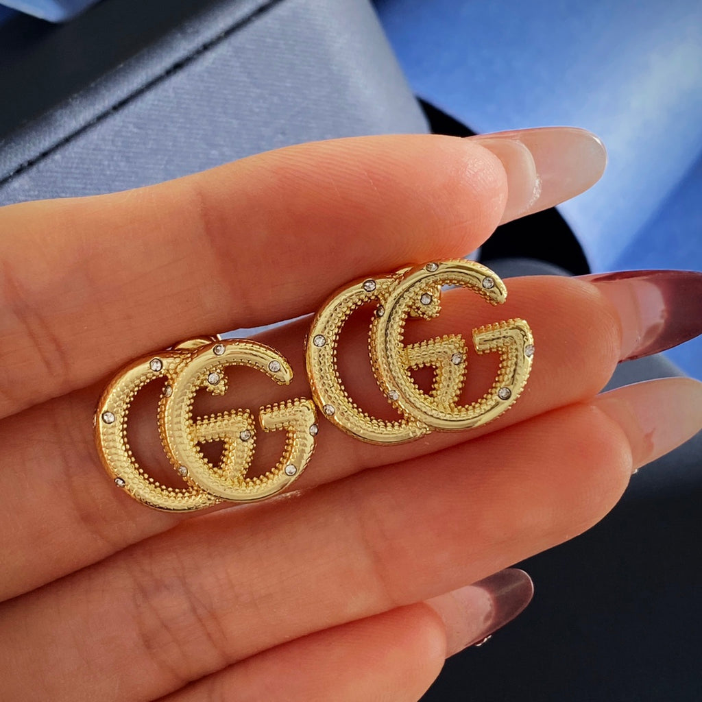 Gucci Interlocking G Gold-Tone GG Letter Stud Earrings - album image 6
