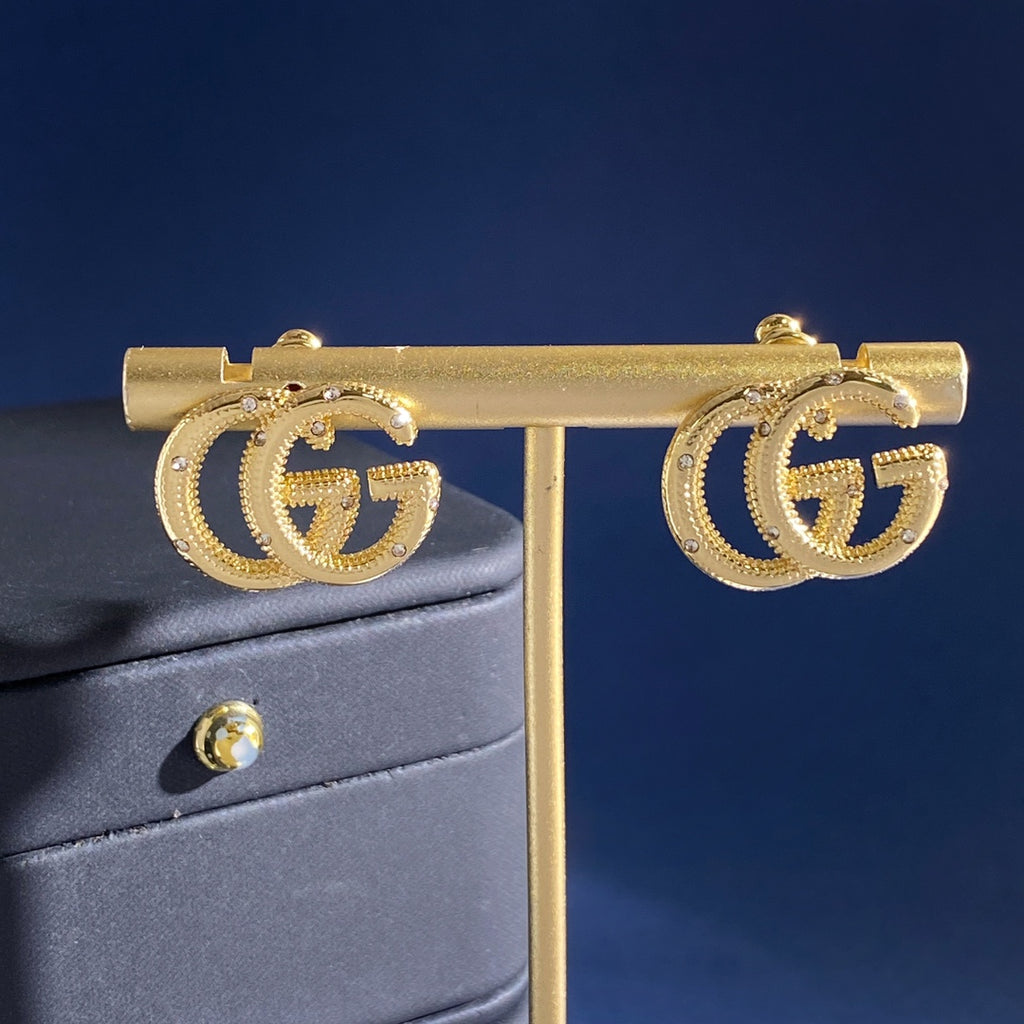 Gucci Interlocking G Gold-Tone GG Letter Stud Earrings - album image 4