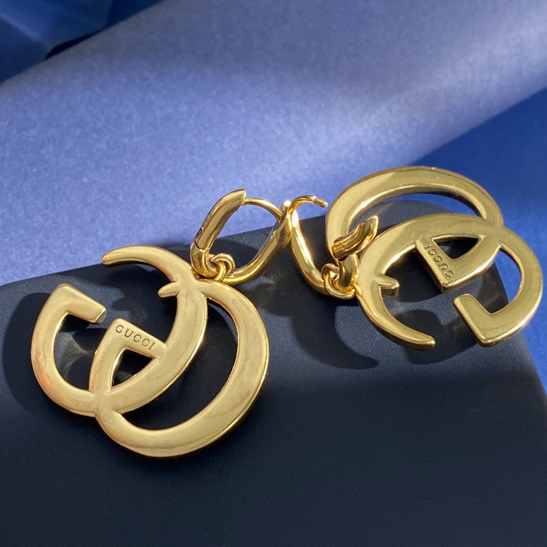 Gucci Interlocking G GG Letter Polished Earrings - album image 9