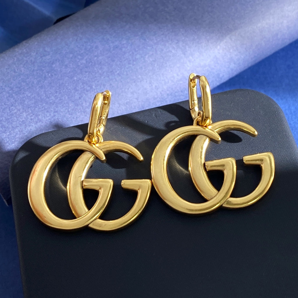 Gucci Interlocking G GG Letter Polished Earrings - album image 1