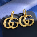 Gucci Interlocking G GG Letter Polished Earrings - album image 1