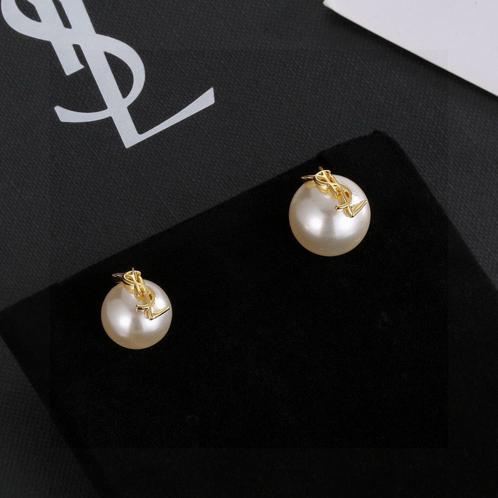 Saint Laurent Asymmetric Pearl Monogram Stud Earrings - album image 1