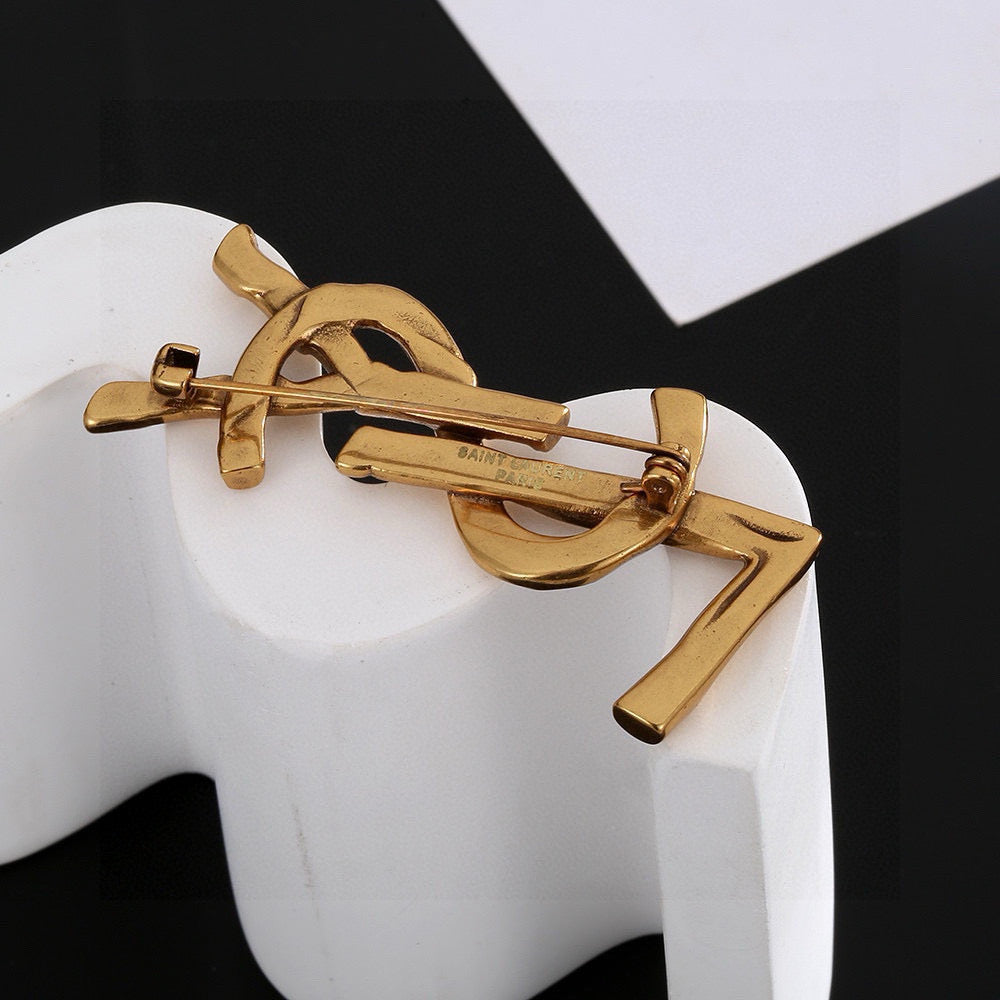 Saint Laurent Silver and Antique Gold-Tone Monogram Brooch - album image 8