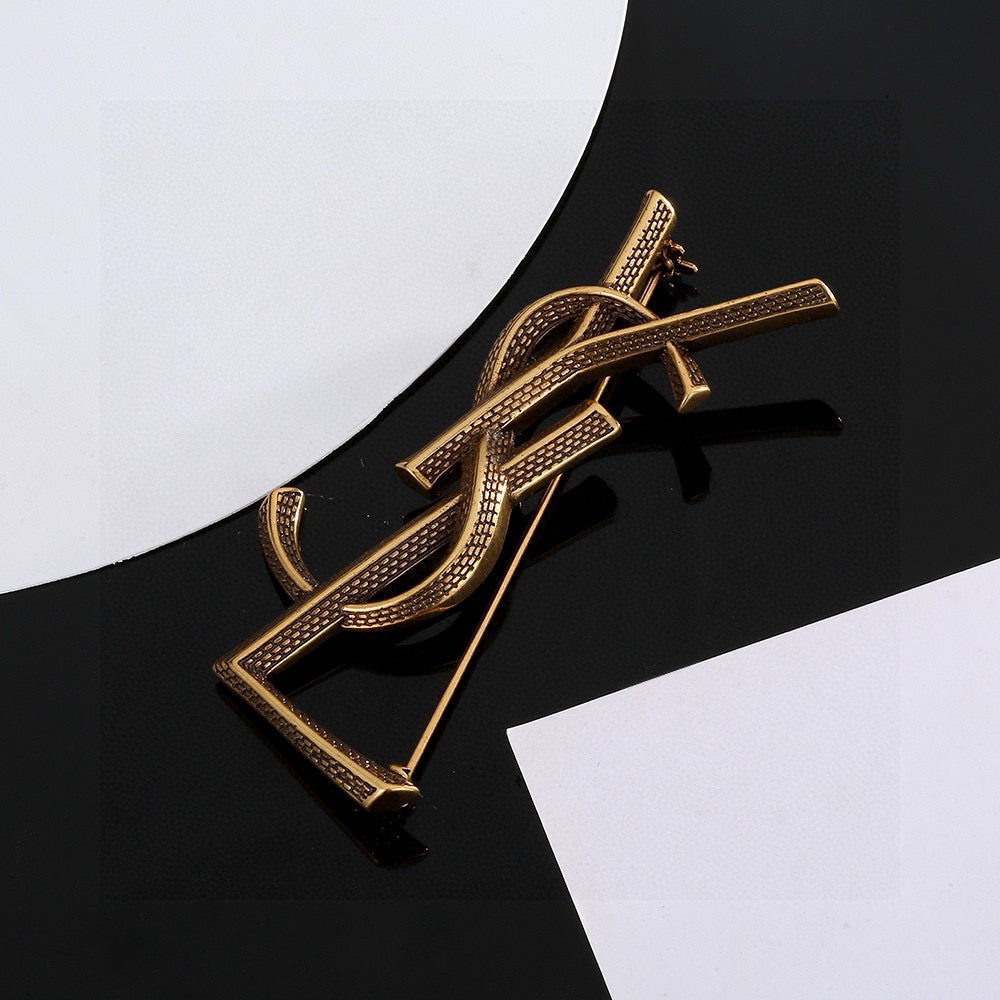 Saint Laurent Silver and Antique Gold-Tone Monogram Brooch - album image 7