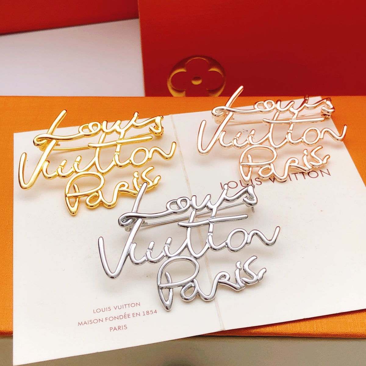 Louis Vuitton Gold-Tone Louis Vuitton Paris Script Brooch - album image 5