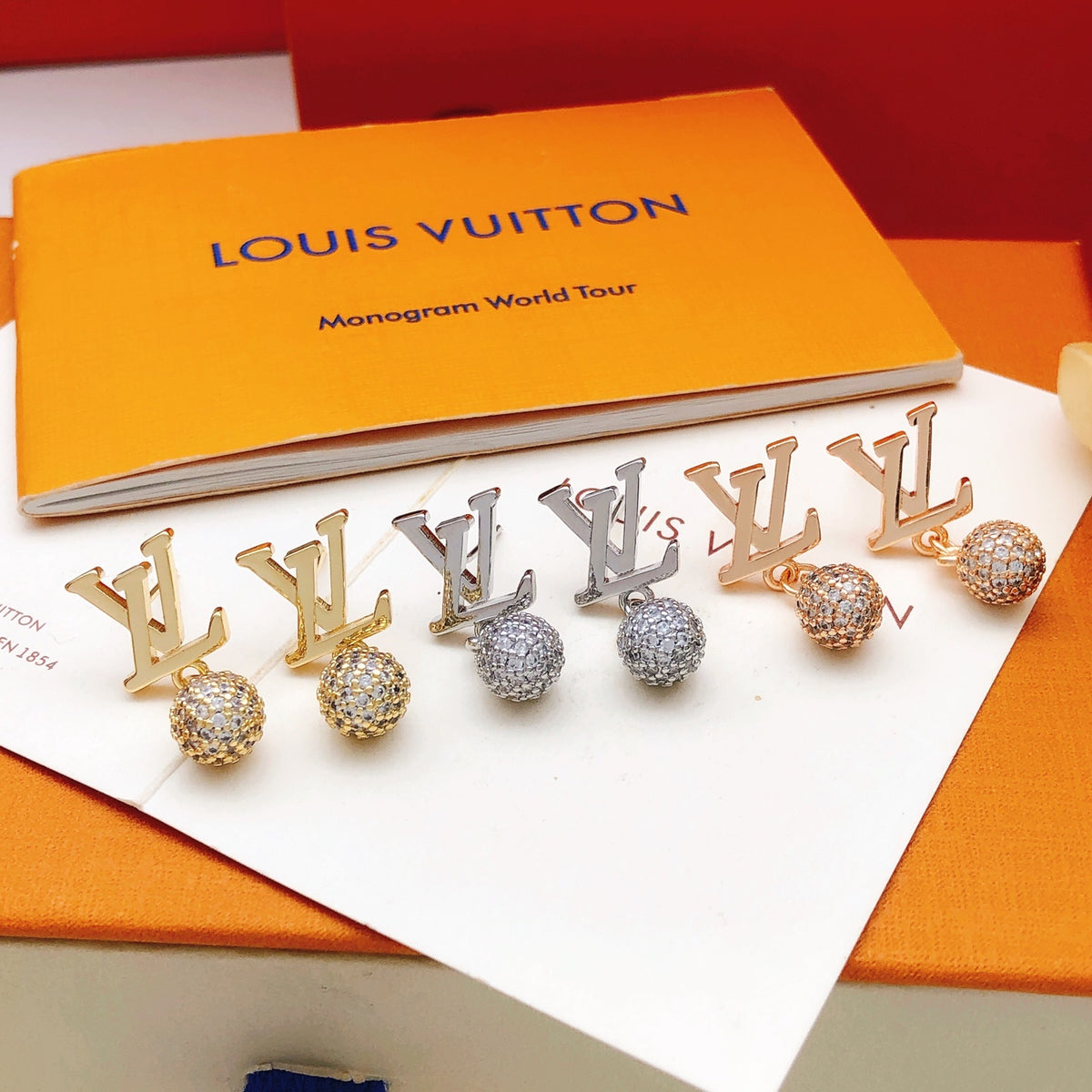Louis Vuitton Crystal Accent Earrings - album image 6