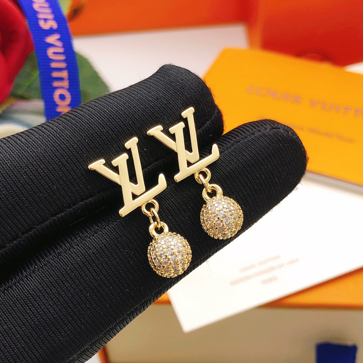 Louis Vuitton Crystal Accent Earrings - album image 1