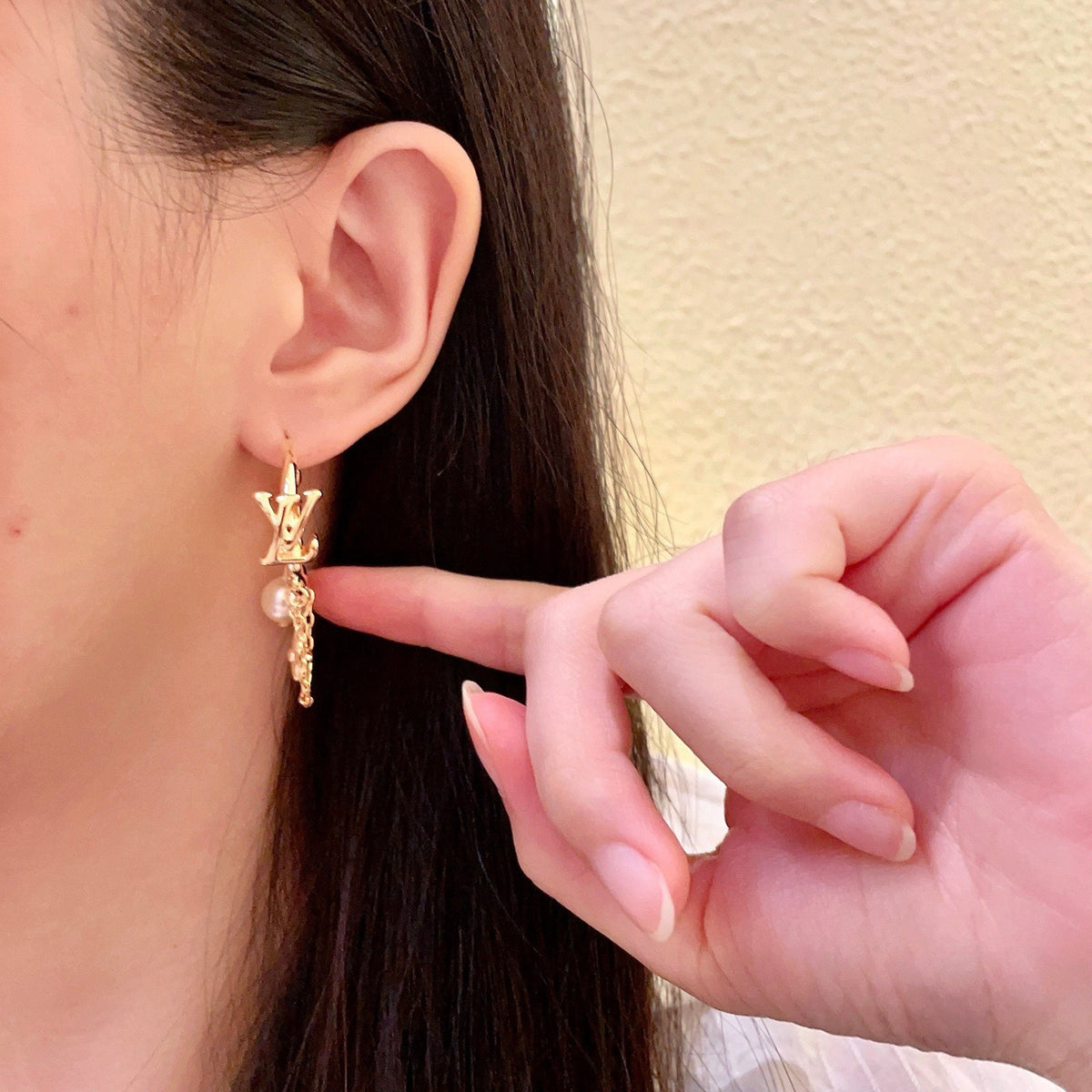 Louis Vuitton LV Letter Stud Earrings - album image 3