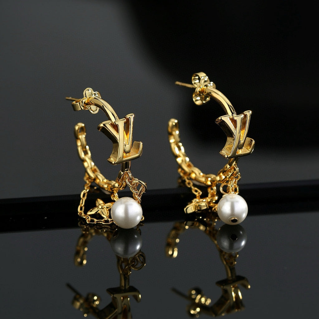 Louis Vuitton LV Letter Stud Earrings - album image 1