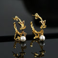 Louis Vuitton LV Letter Stud Earrings - album image 1