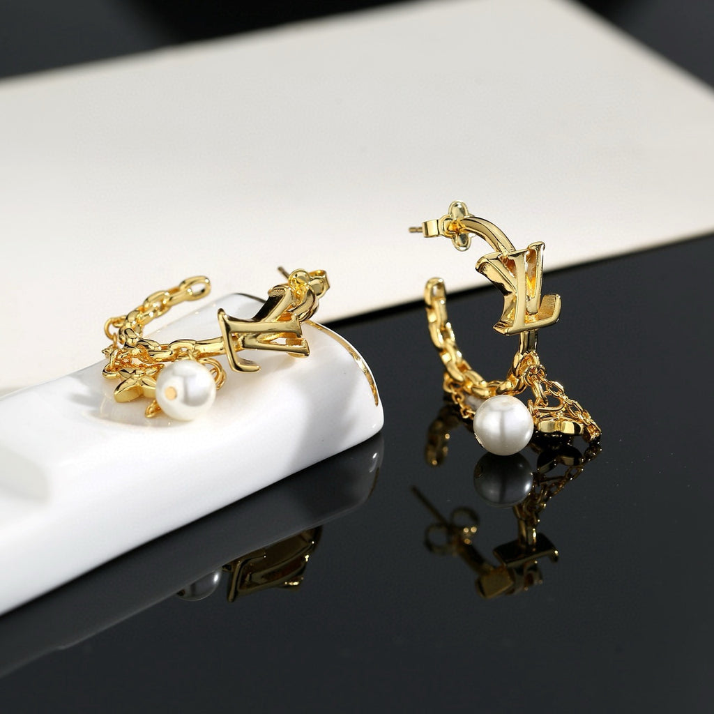 Louis Vuitton LV Letter Stud Earrings - album image 4