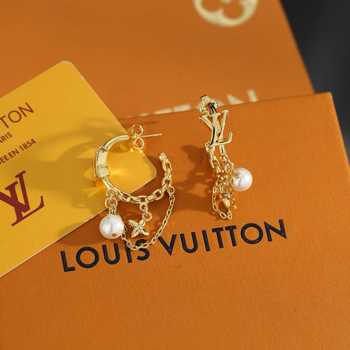 Louis Vuitton LV Letter Stud Earrings - album image 2