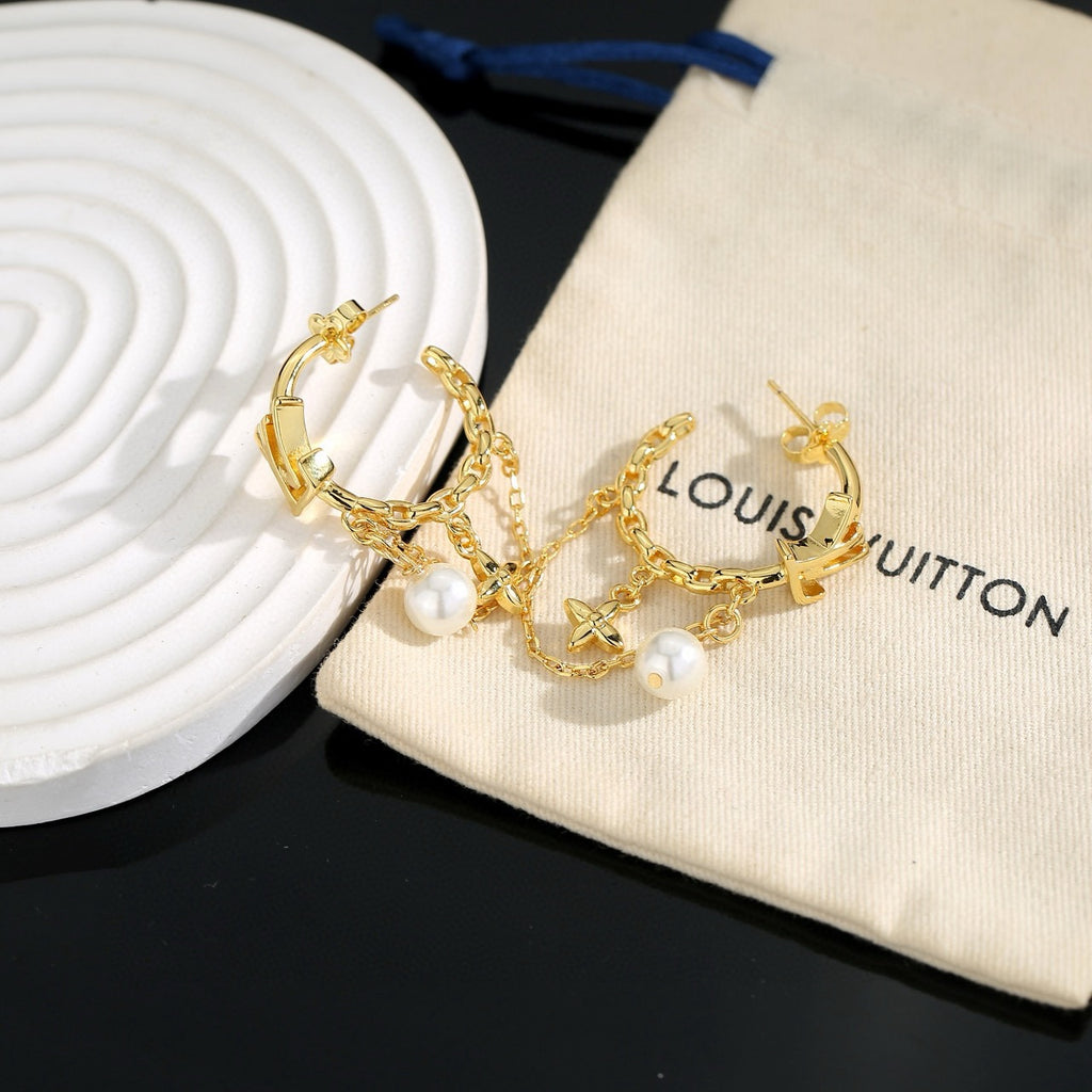 Louis Vuitton LV Letter Stud Earrings - album image 6