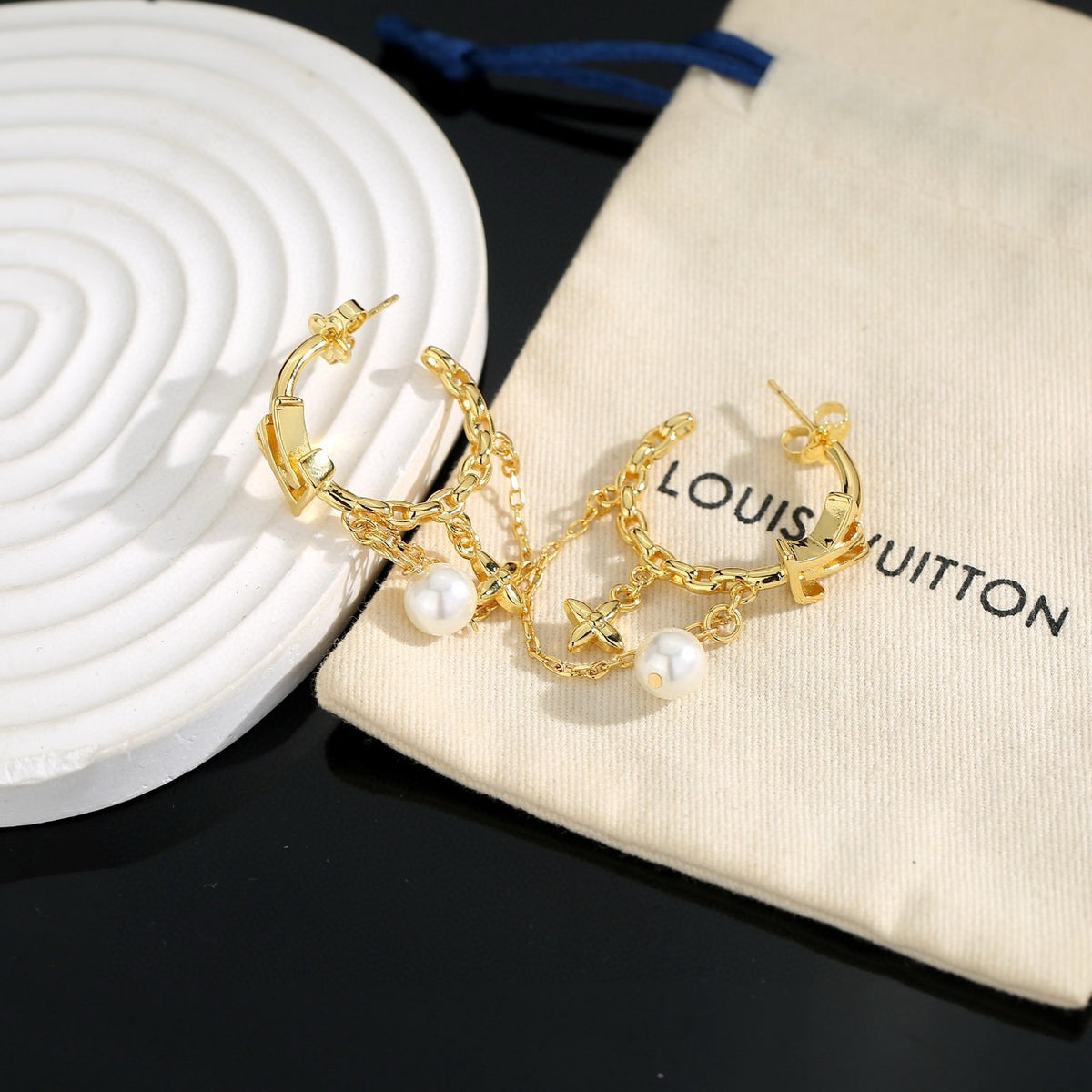 Louis Vuitton LV Letter Stud Earrings - album image 6