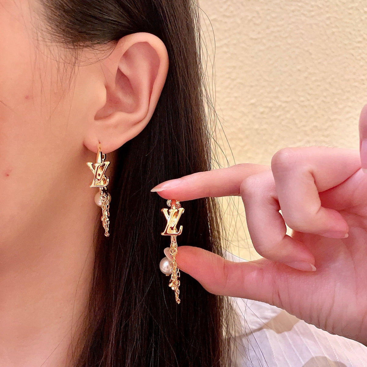 Louis Vuitton LV Letter Stud Earrings - album image 7