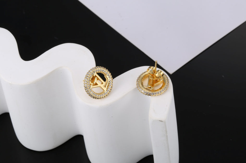 Louis Vuitton LV Letter Stud Earrings - album image 3