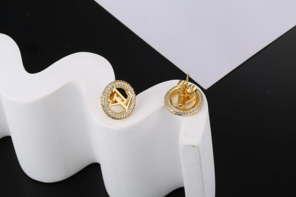 Louis Vuitton LV Letter Stud Earrings - album image 3