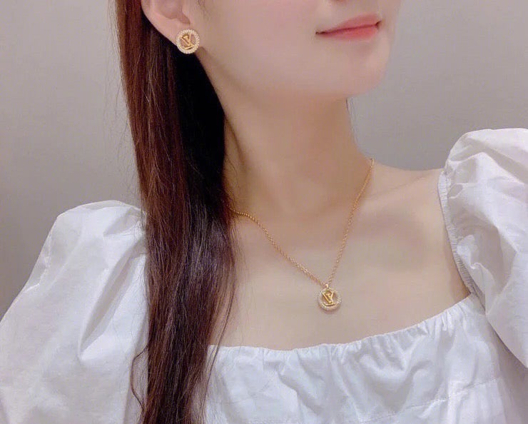 Louis Vuitton LV Letter Stud Earrings - album image 5