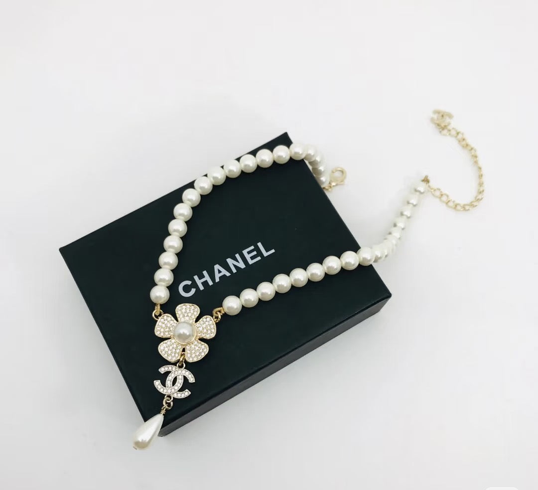 Chanel Interlocking C Camellia Pearl Necklace - album image 1