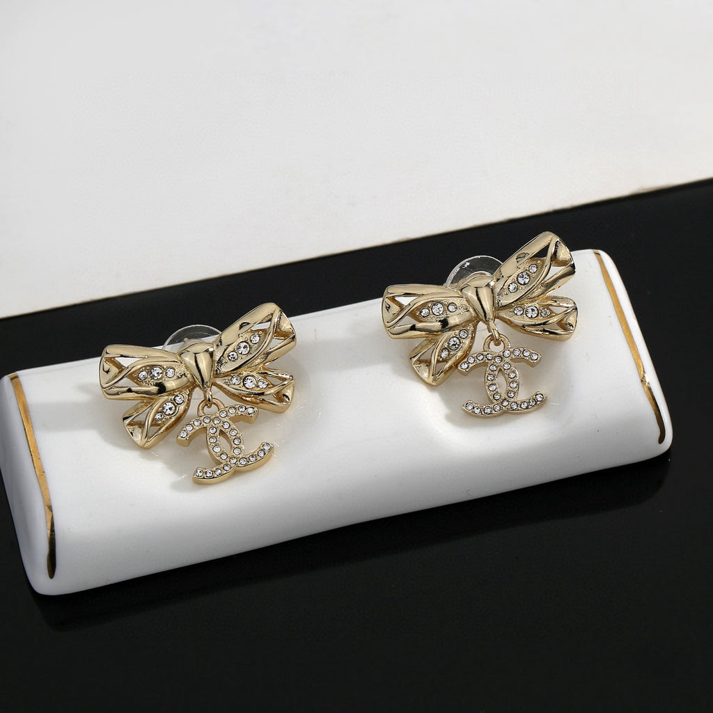 Chanel Interlocking C Bow Butterfly Earrings - album image 6
