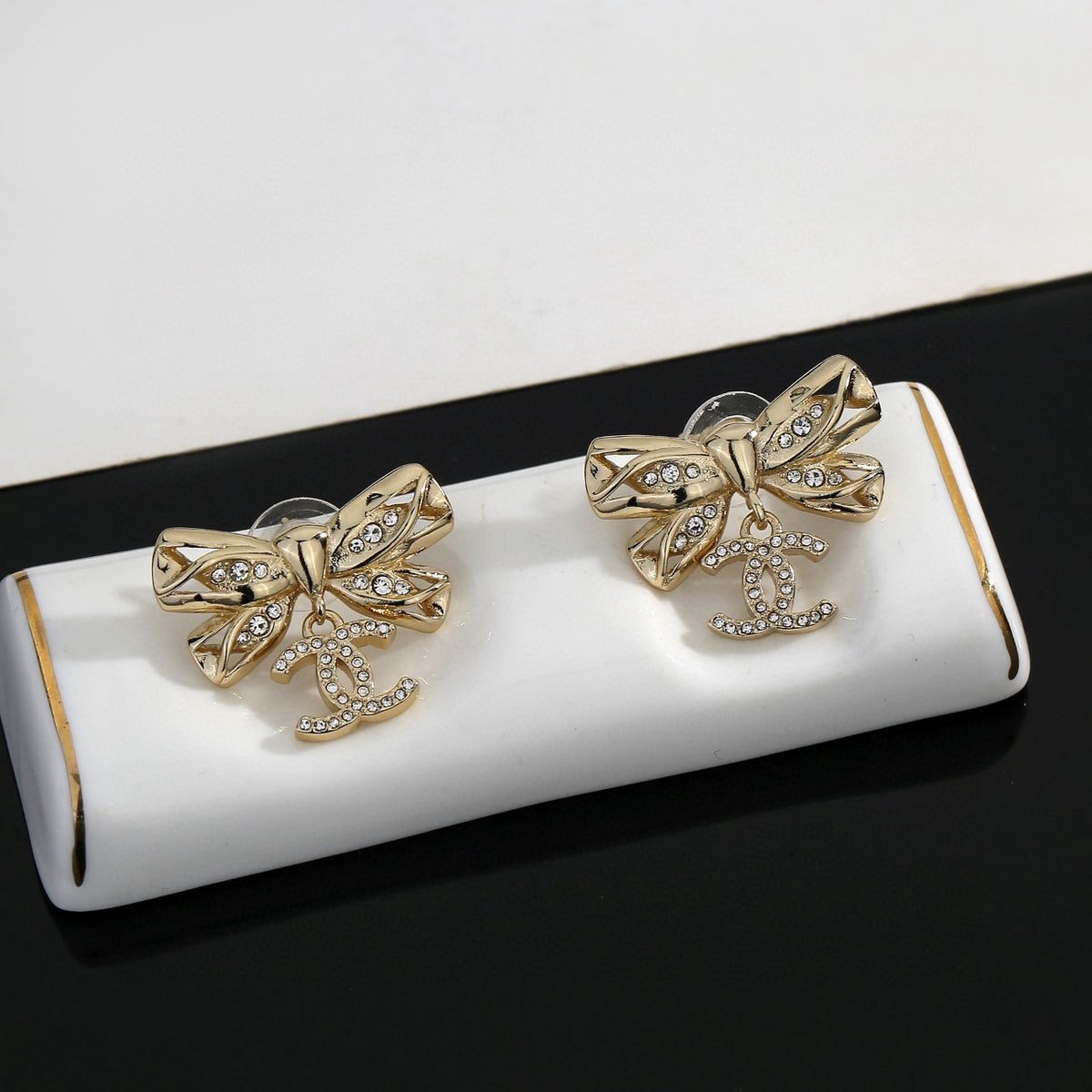 Chanel Interlocking C Bow Butterfly Earrings - album image 6