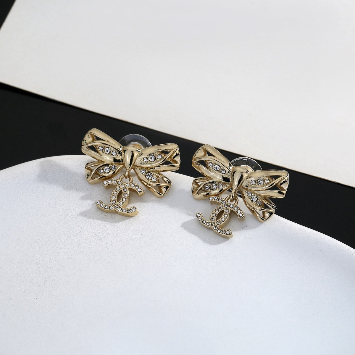 Chanel Interlocking C Bow Butterfly Earrings - album image 2