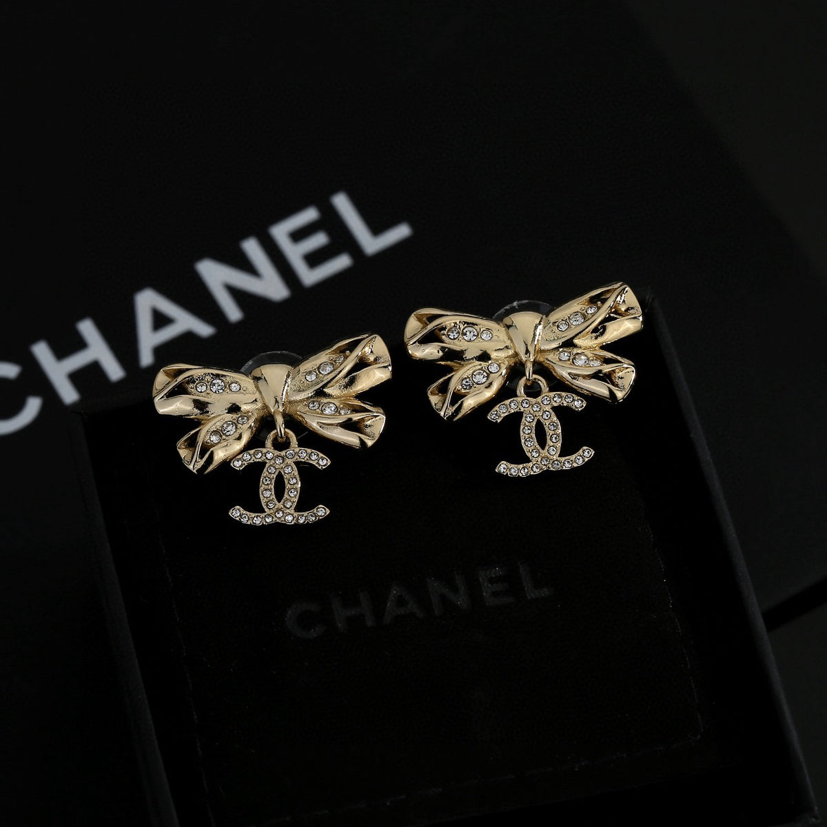 Chanel Interlocking C Bow Butterfly Earrings - album image 8