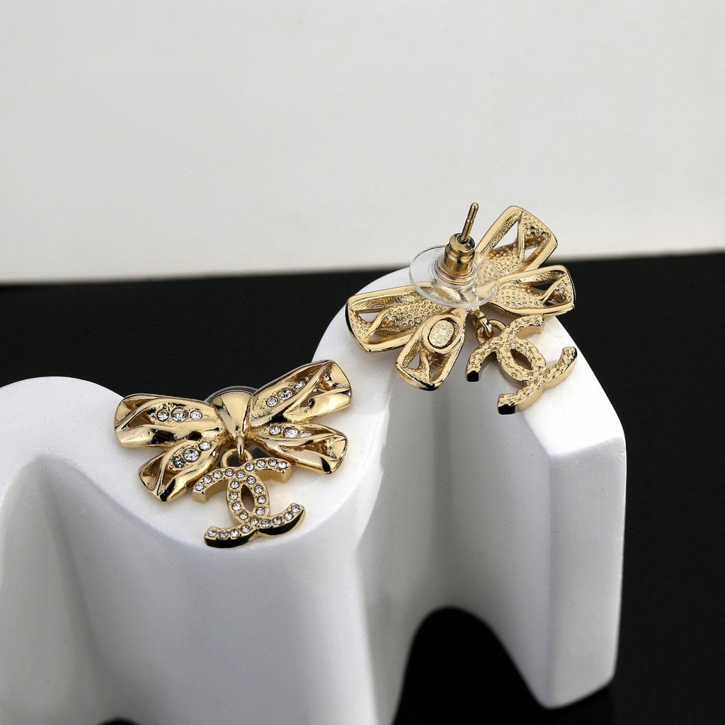 Chanel Interlocking C Bow Butterfly Earrings - album image 7