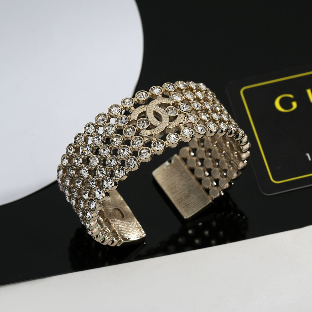 Chanel Silver-Tone Wide Woven Bangle - album image 1