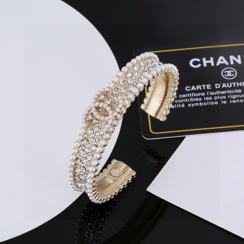 Chanel Pearl Crystal Accent Bangle - album image 1