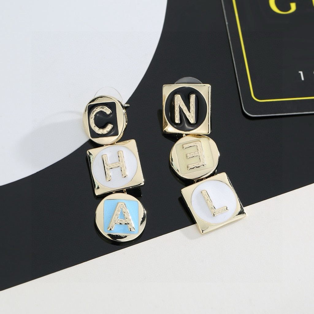 Chanel Letter Earrings - album image 1