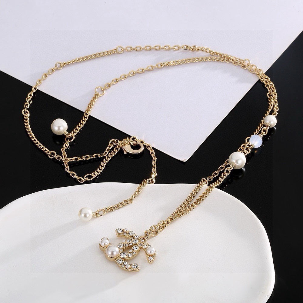 Chanel Interlocking C Pearl Necklace - album image 1