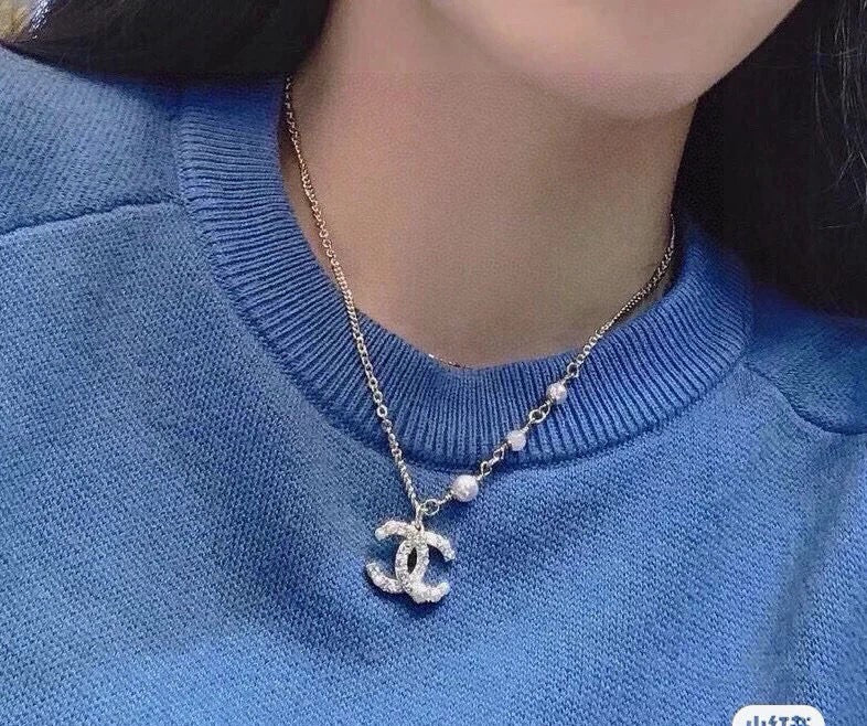 Chanel Interlocking C Pearl Necklace - album image 8